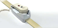 Med-Pat HO-100 Adjustable Bedrail Holder securely holding a hospital phone on a bed rail for patient communication.